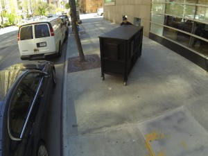 Rolling into position, outside Sotheby's, 5/5/14